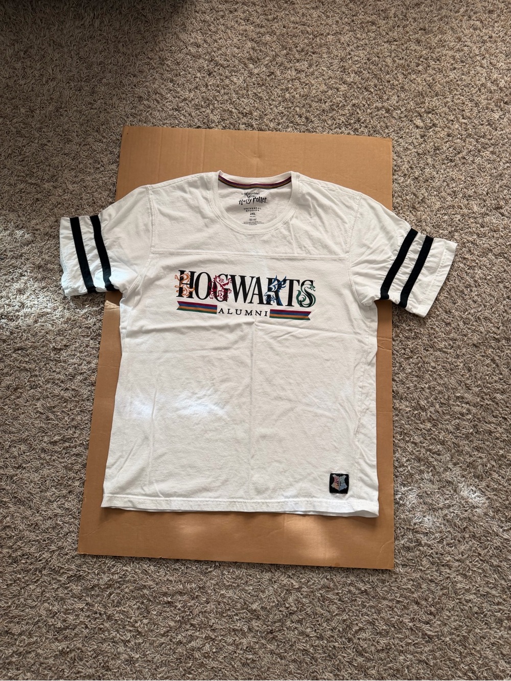 Warner Bros. White Hogwarts Alumni Tee with Black Sleeve Stripes